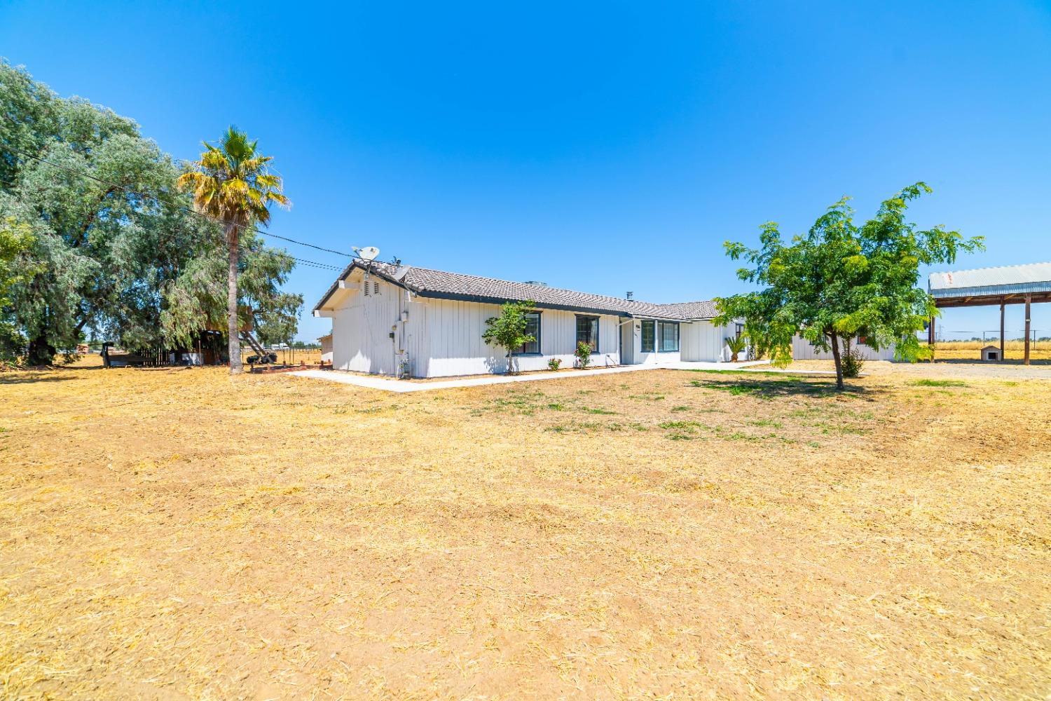 16680 Austin Street Madera, CA 93638 - Photo 28 of 40 a house view with swimming pool