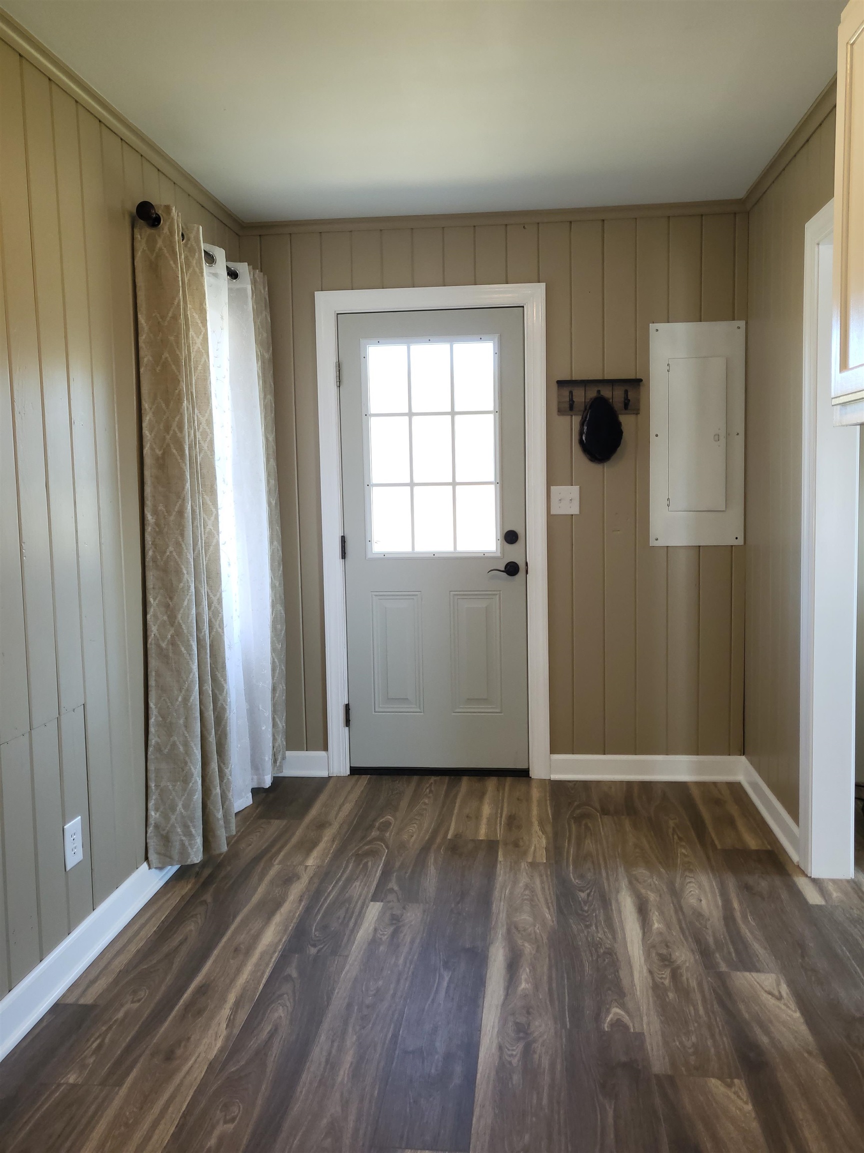 3637 Lightfoot Luckett Road Ripley, TN 38063 - Photo 15 of 25 an empty room with wooden floor and windows