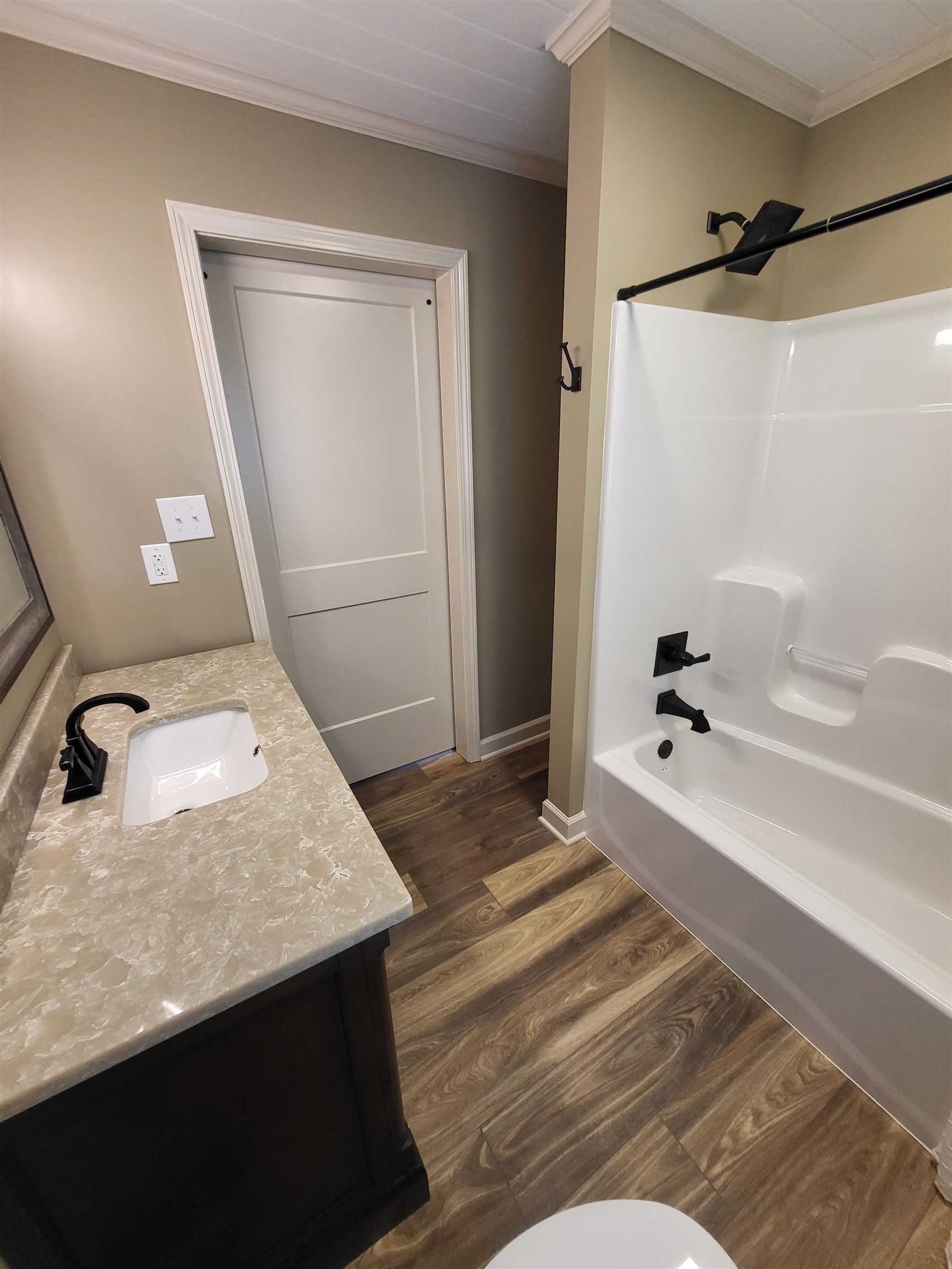 3637 Lightfoot Luckett Road Ripley, TN 38063 - Photo 21 of 25 a bathroom with a sink and a mirror