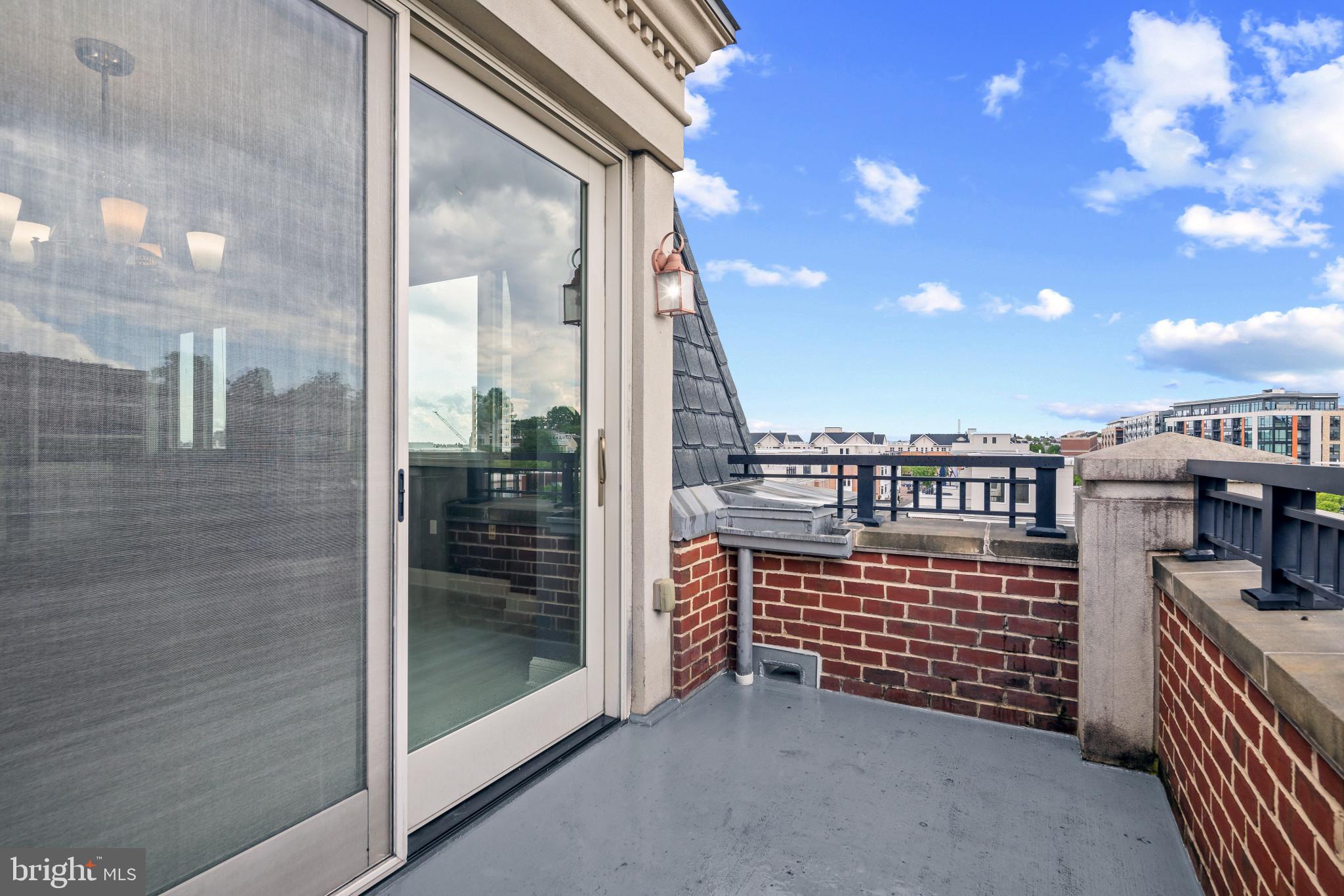 801 Key Highway, Unit P64 Baltimore, MD 21230 - Photo 35 of 52 Balcony Overlooking Federal Hill and City Skyline