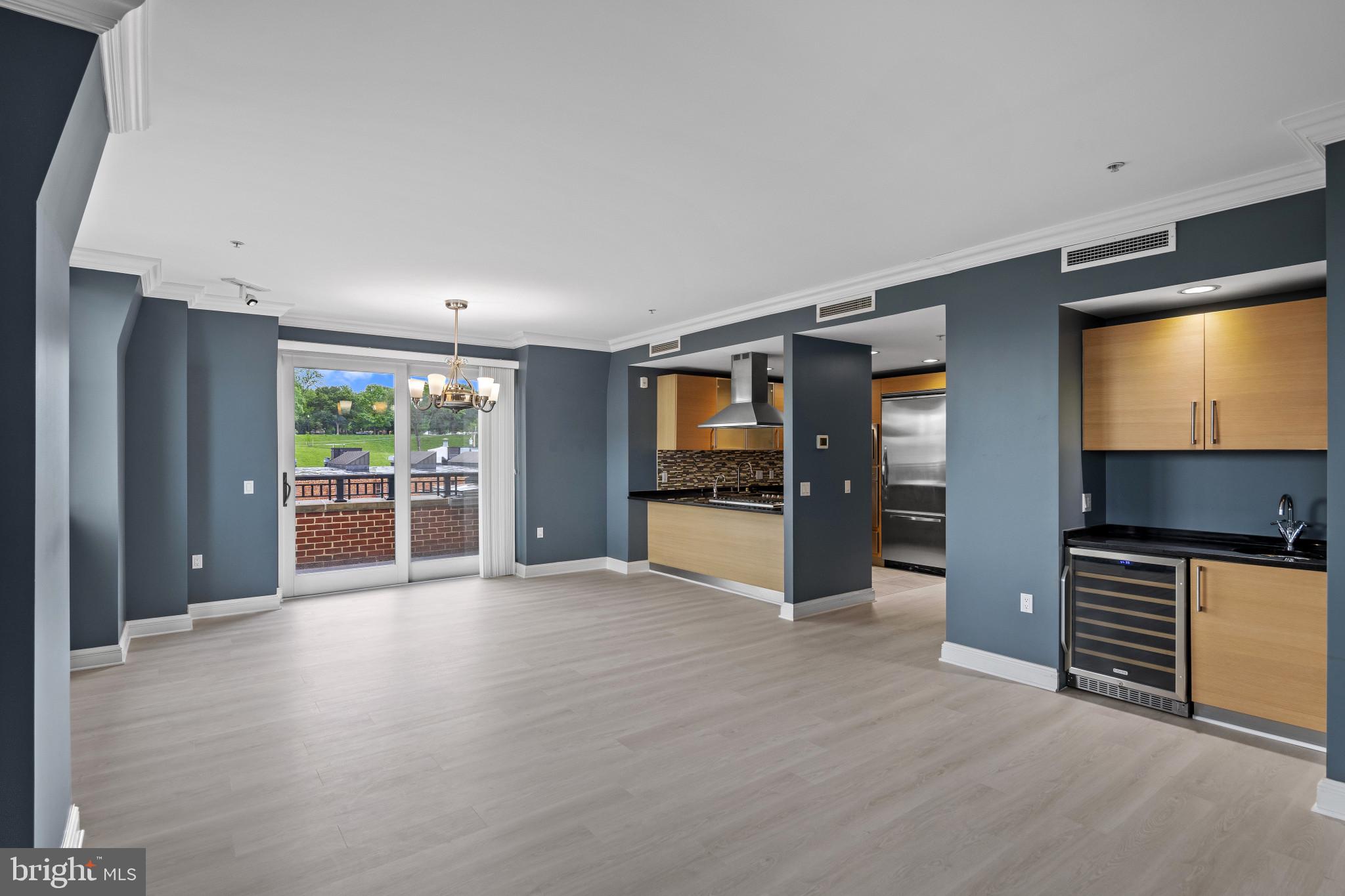 801 Key Highway, Unit P64 Baltimore, MD 21230 - Photo 8 of 52 Living Room into Dining Room and Kitchen