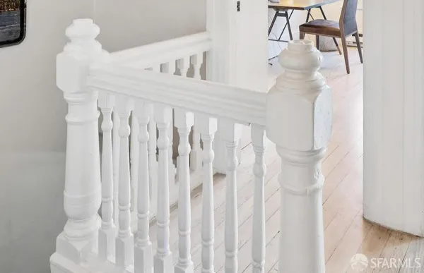 a view of entryway with wooden floor
