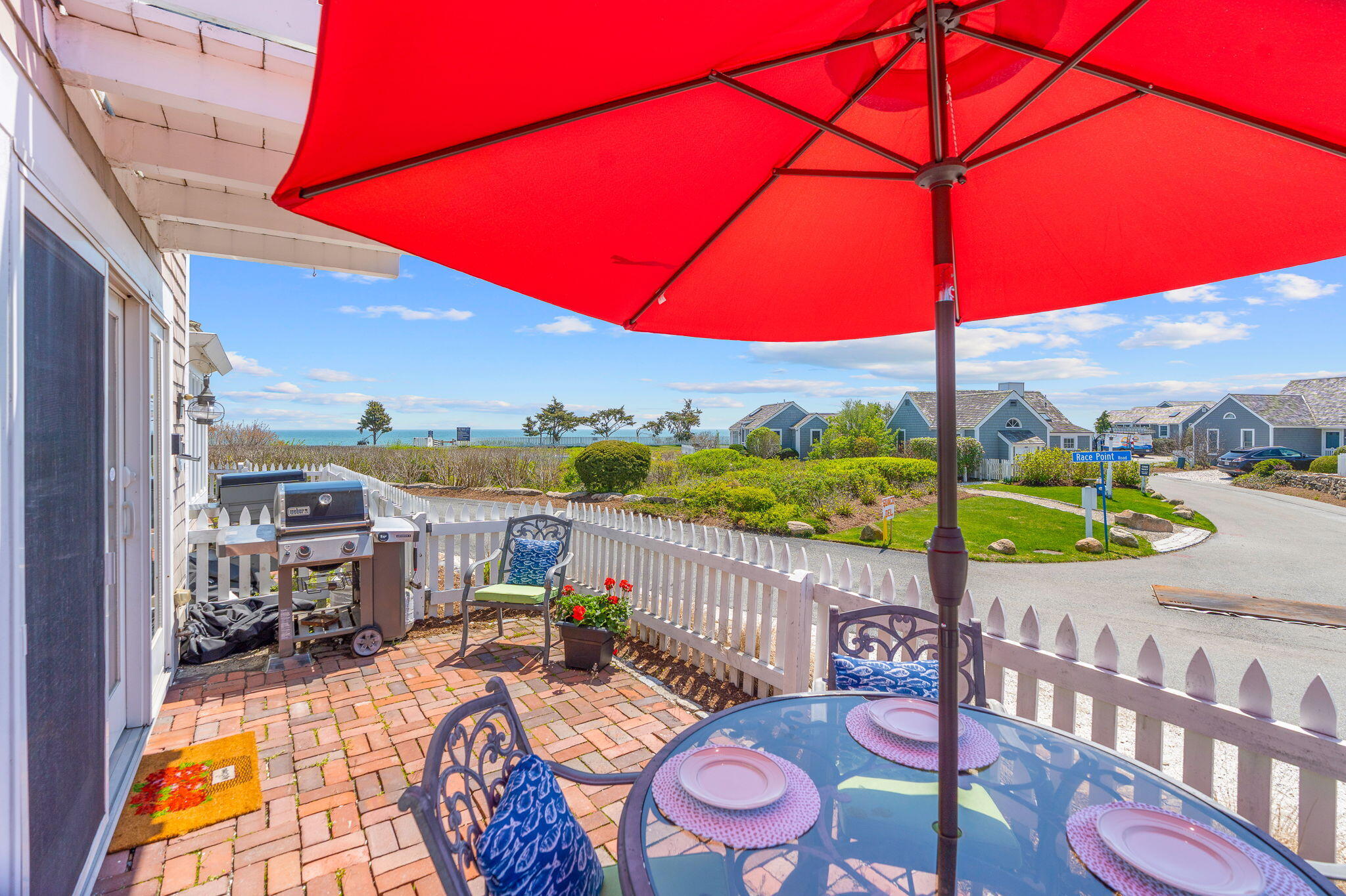 4 Race Point Road, Unit 4 Mashpee, MA 02649 - Photo 5 of 43 a view of a street with sitting area