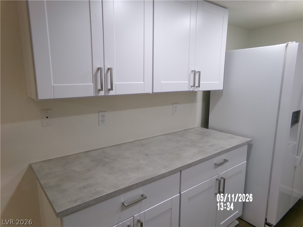 2995 East Sunset Road, Unit 222 Las Vegas, NV 89120 - Photo 6 of 29 This modern kitchen offers ample storage with sleek cabinetry and durable countertops.