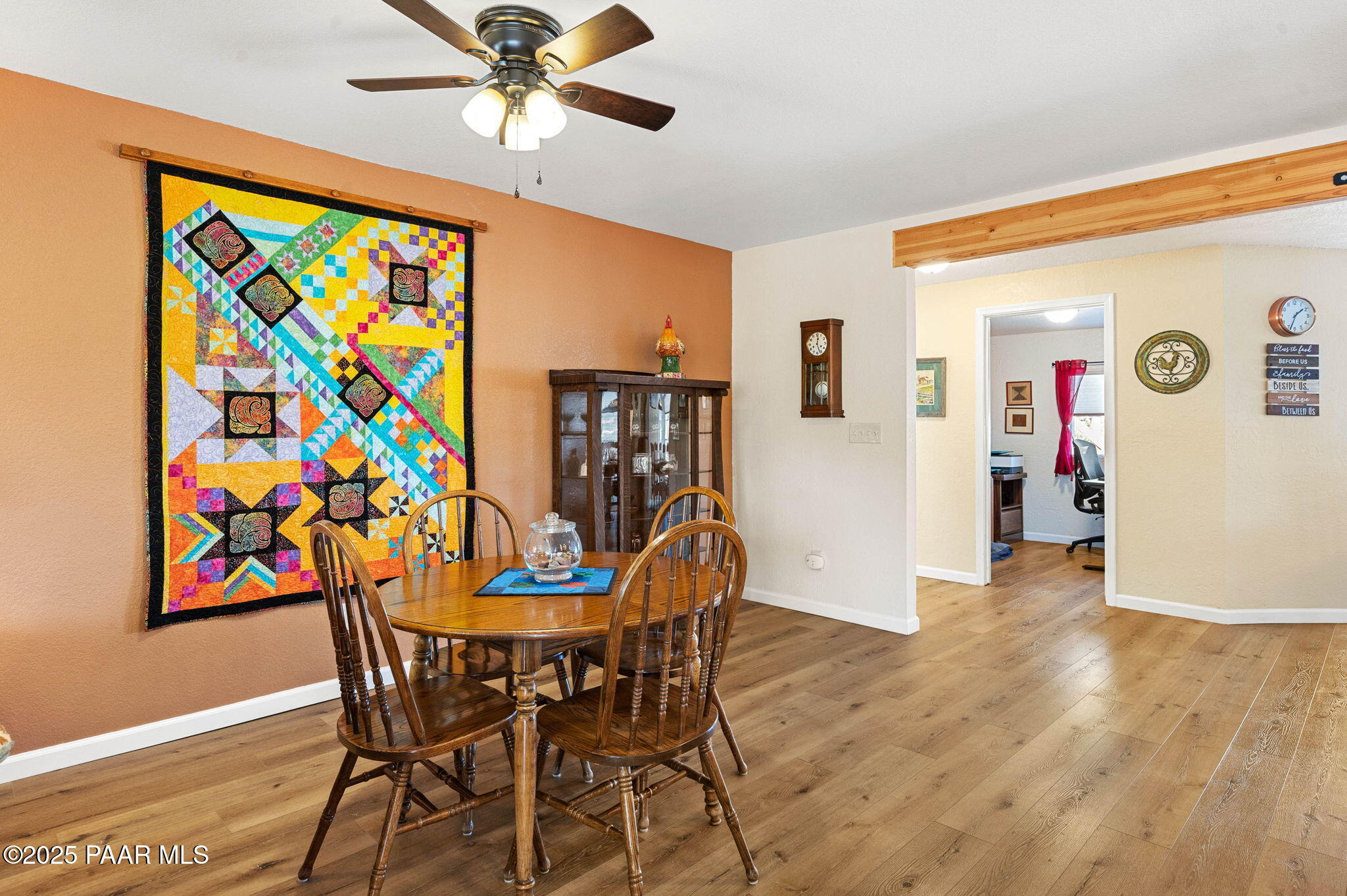 1326 East Ben Road Chino Valley, AZ 86323 - Photo 17 of 51 a view of a dining room with furniture and a chandelier