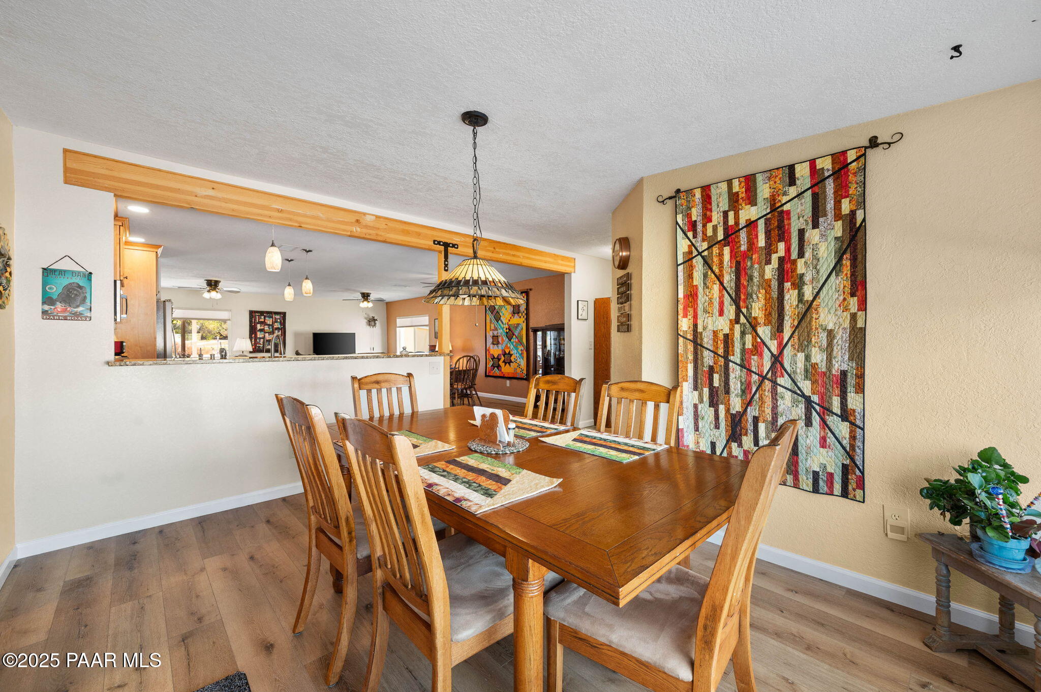 1326 East Ben Road Chino Valley, AZ 86323 - Photo 19 of 51 a dining room with furniture and wooden floor
