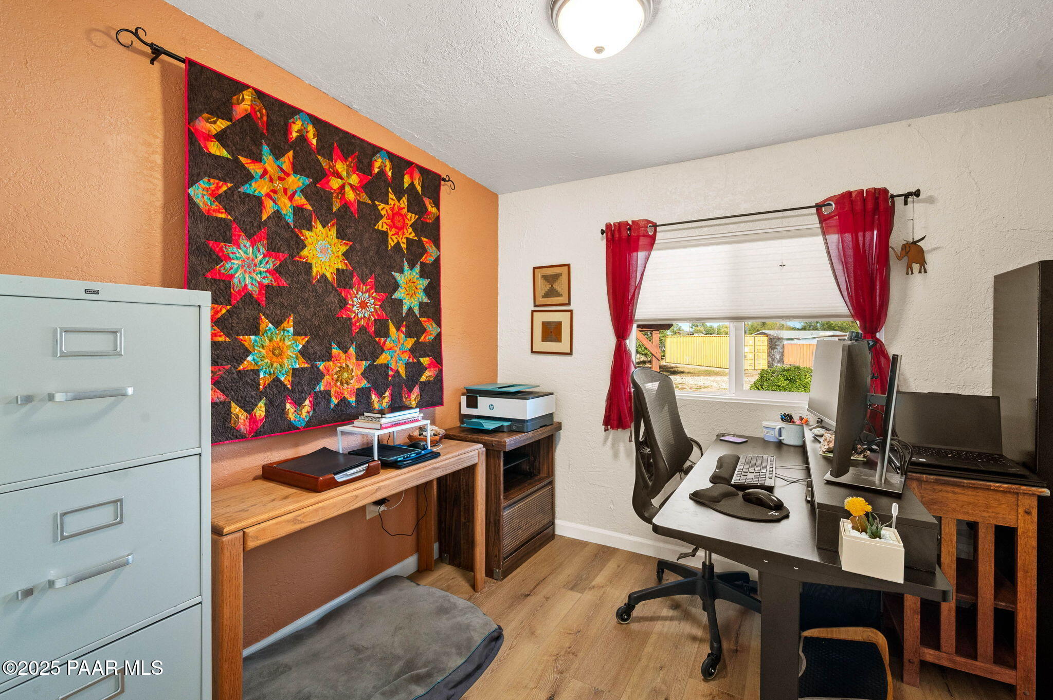 1326 East Ben Road Chino Valley, AZ 86323 - Photo 22 of 51 a view of a workspace with furniture and a window