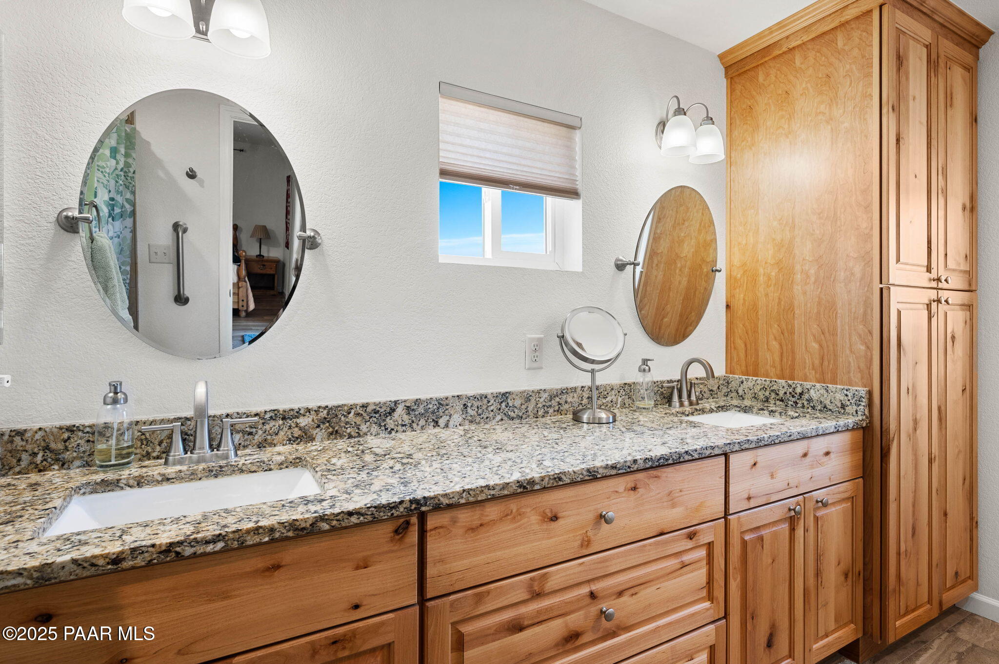1326 East Ben Road Chino Valley, AZ 86323 - Photo 24 of 51 a bathroom with a granite countertop double vanity sinks and a mirror