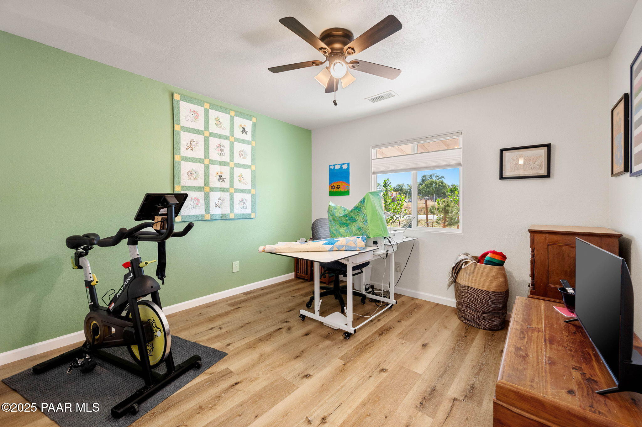1326 East Ben Road Chino Valley, AZ 86323 - Photo 30 of 51 a view of a workspace with furniture and a window
