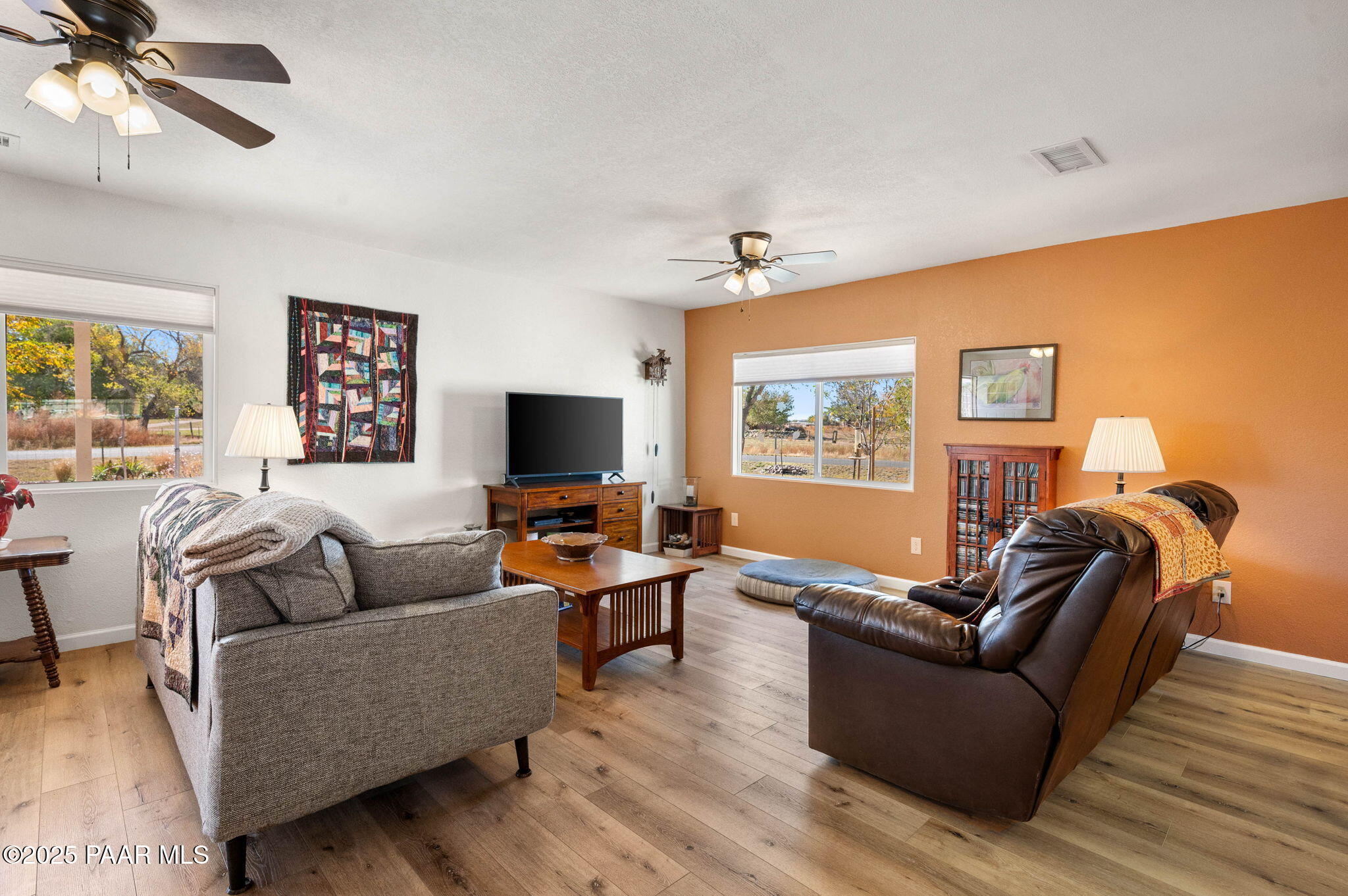 1326 East Ben Road Chino Valley, AZ 86323 - Photo 8 of 51 a living room with furniture and a flat screen tv