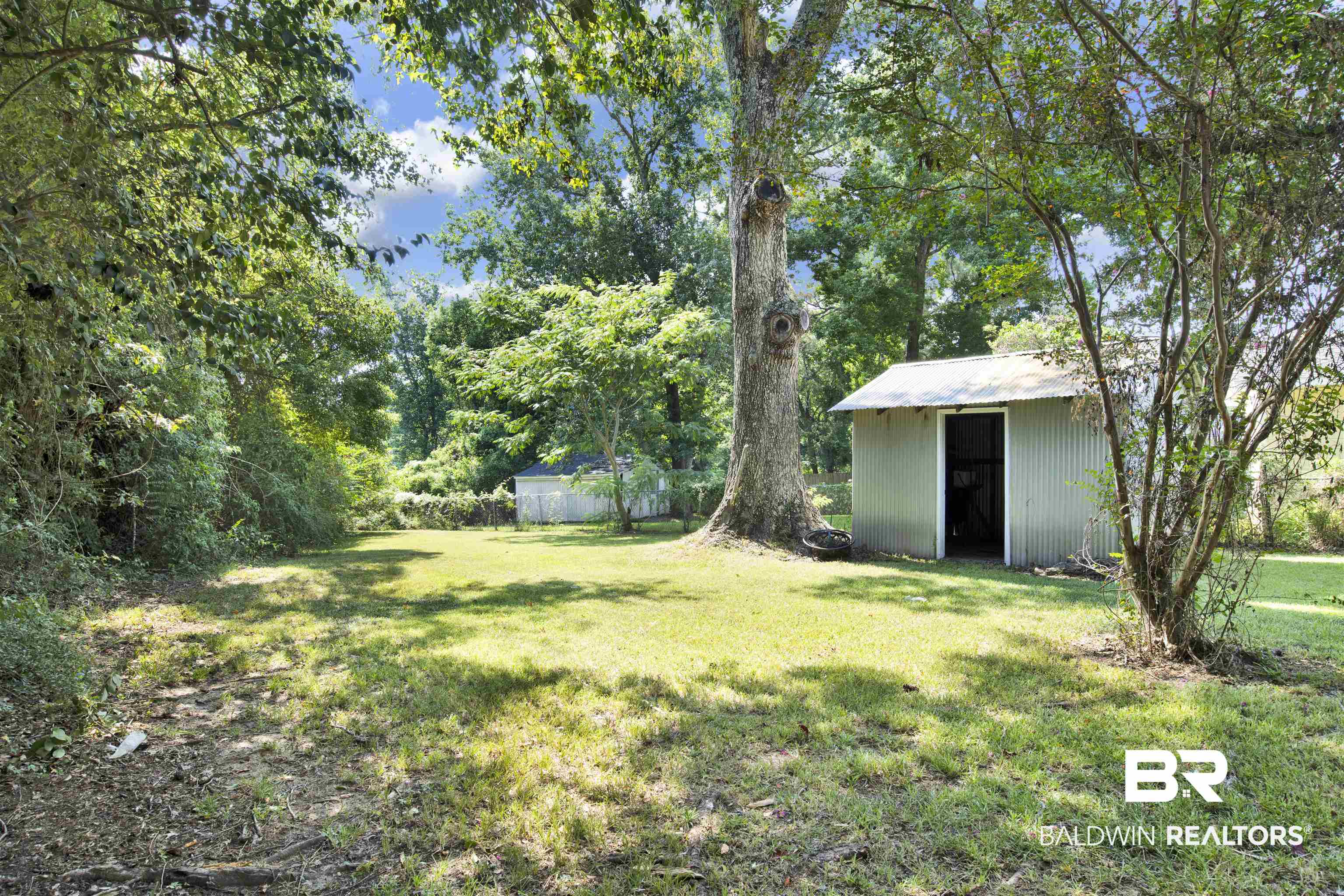 2 Lee Circle Daphne, AL 36527 - Photo 19 of 21 View of yard featuring an outdoor structure