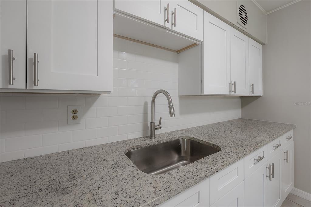 10411 North Woodmere Road Tampa, FL 33617 - Photo 10 of 29