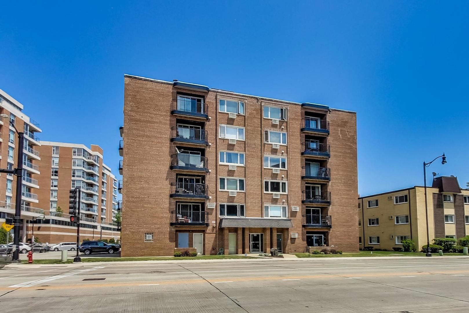 659 South River Road, Unit 5C Des Plaines, IL 60016 - Photo 1 of 24 a front view of a building