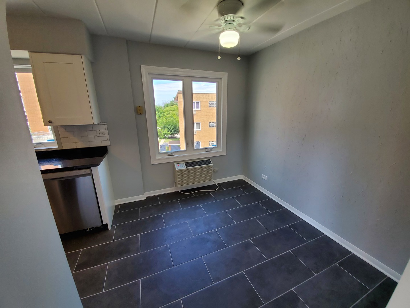 659 South River Road, Unit 5C Des Plaines, IL 60016 - Photo 16 of 24 a view of an empty room with a window