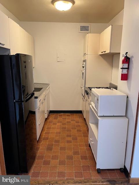2475 Virginia Avenue Northwest, Unit 908 Washington, DC 20037 - Photo 16 of 24 Cozy kitchen with historic charm.
