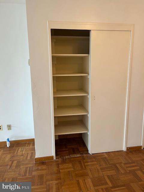 2475 Virginia Avenue Northwest, Unit 908 Washington, DC 20037 - Photo 24 of 24 Spacious closet with organized shelving.