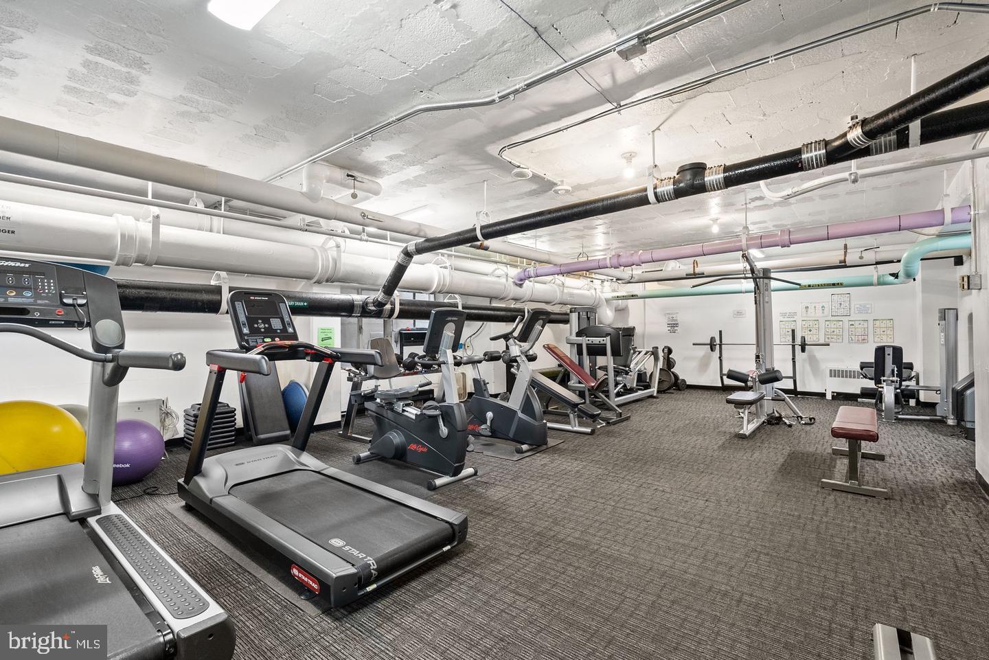 2475 Virginia Avenue Northwest, Unit 908 Washington, DC 20037 - Photo 5 of 24 Modern fitness center with diverse equipment.