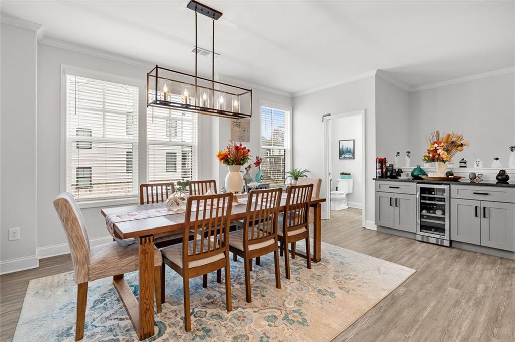 6176 Eves Way Norcross, GA 30071 - Photo 11 of 36 a dining room with furniture and window