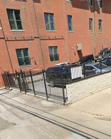 front view of a building with a bench