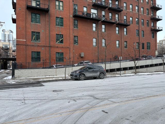 a car parked in front of a building