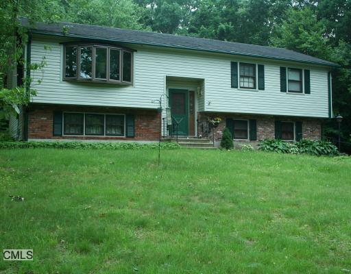 8 Chaden Road Seymour, CT 06483 - Photo 1 of 1 a front view of a house with a yard