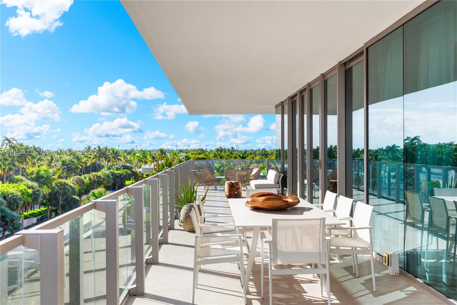 360 Ocean Drive, Unit 501S Key Biscayne, FL 33149 - Photo 29 of 40 a view of swimming pool from a balcony