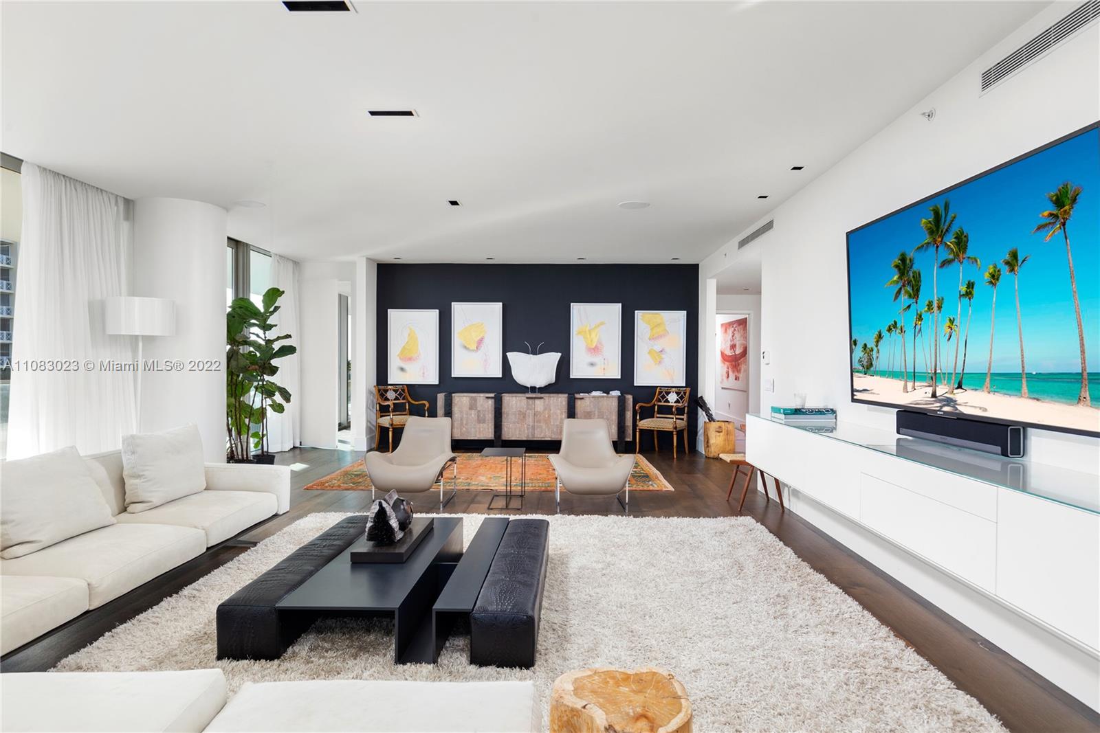 360 Ocean Drive, Unit 501S Key Biscayne, FL 33149 - Photo 10 of 40 a living room with furniture and a large window