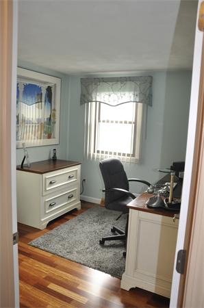 26 Mansfield Drive Wakefield, MA 01880 - Photo 12 of 26 a room with storage and window