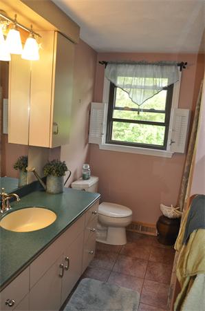26 Mansfield Drive Wakefield, MA 01880 - Photo 13 of 26 a bathroom with a granite countertop toilet sink and mirror