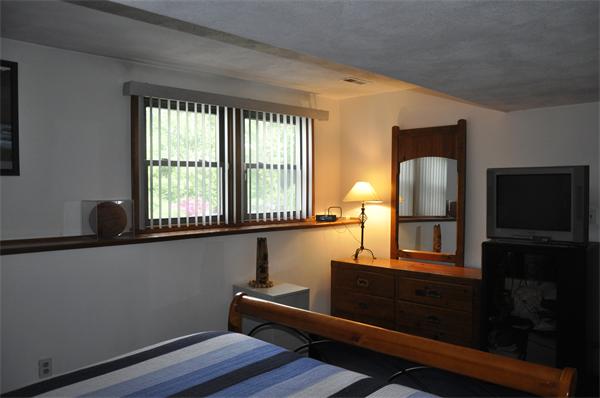 26 Mansfield Drive Wakefield, MA 01880 - Photo 15 of 26 a view of a room with wooden floor and windows