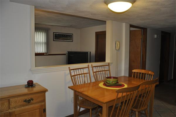 26 Mansfield Drive Wakefield, MA 01880 - Photo 18 of 26 a view of a dining room with furniture and window
