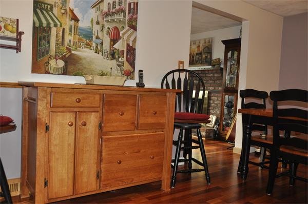 26 Mansfield Drive Wakefield, MA 01880 - Photo 7 of 26 a view of a dining room with wooden floor