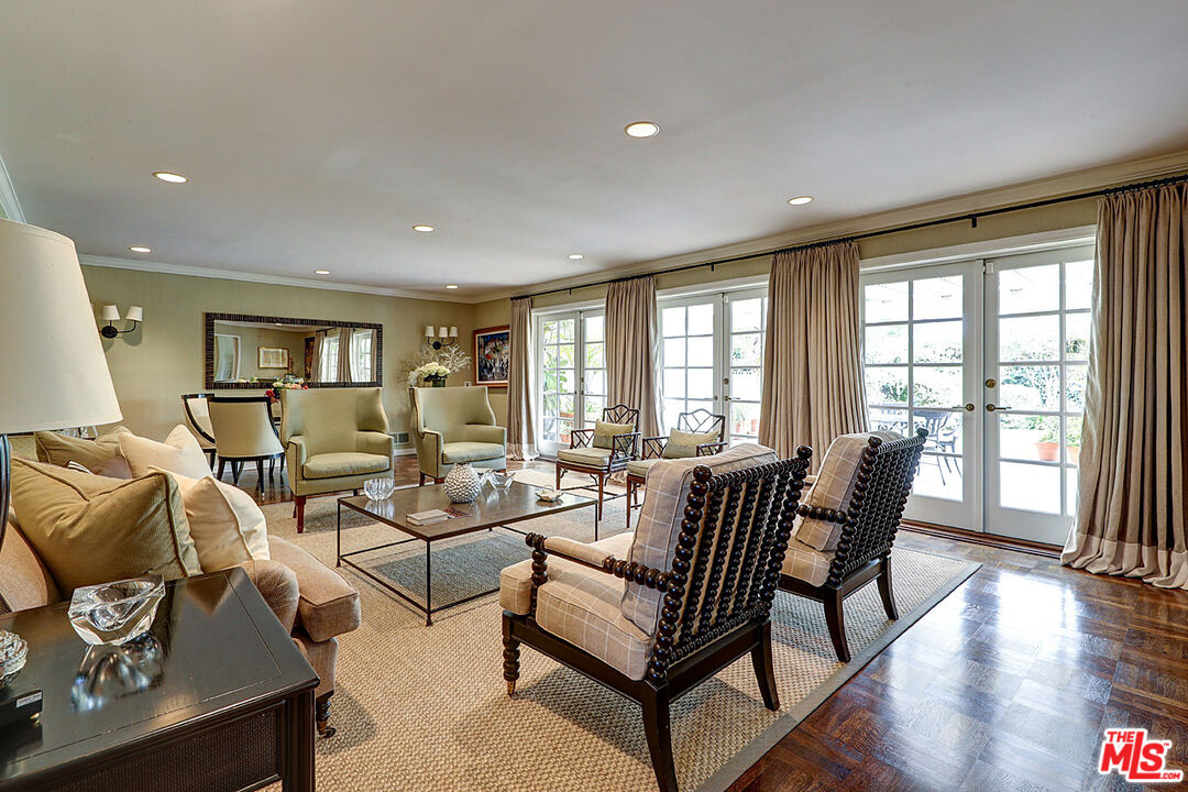 322 North June Street Los Angeles, CA 90004 - Photo 11 of 36 a living room with furniture and wooden floor