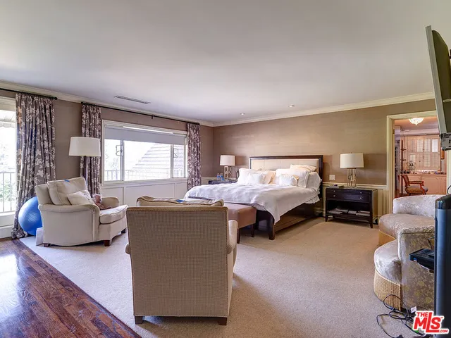 a view of a house with a backyard and a patio