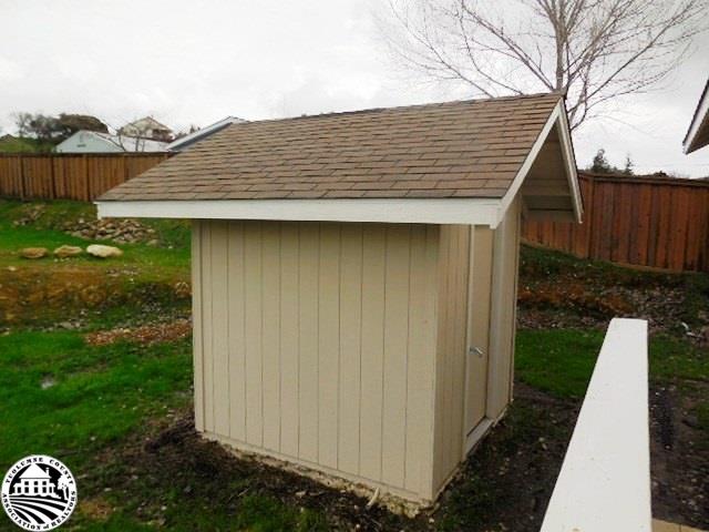 2093 Quail Hill Road Copperopolis, CA 95228 - Photo 14 of 14 a backyard of a house