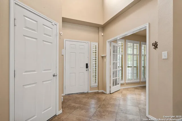 a view of a hallway with closet area