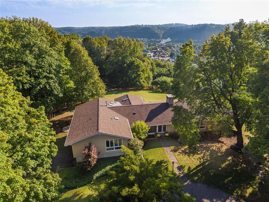 450 Backbone Road Sewickley, PA 15143 - Photo 1 of 24 Sited on 7 private acres of Sewickley Heights land-you can see over the village rooftops and across the Ohio, to the other side.