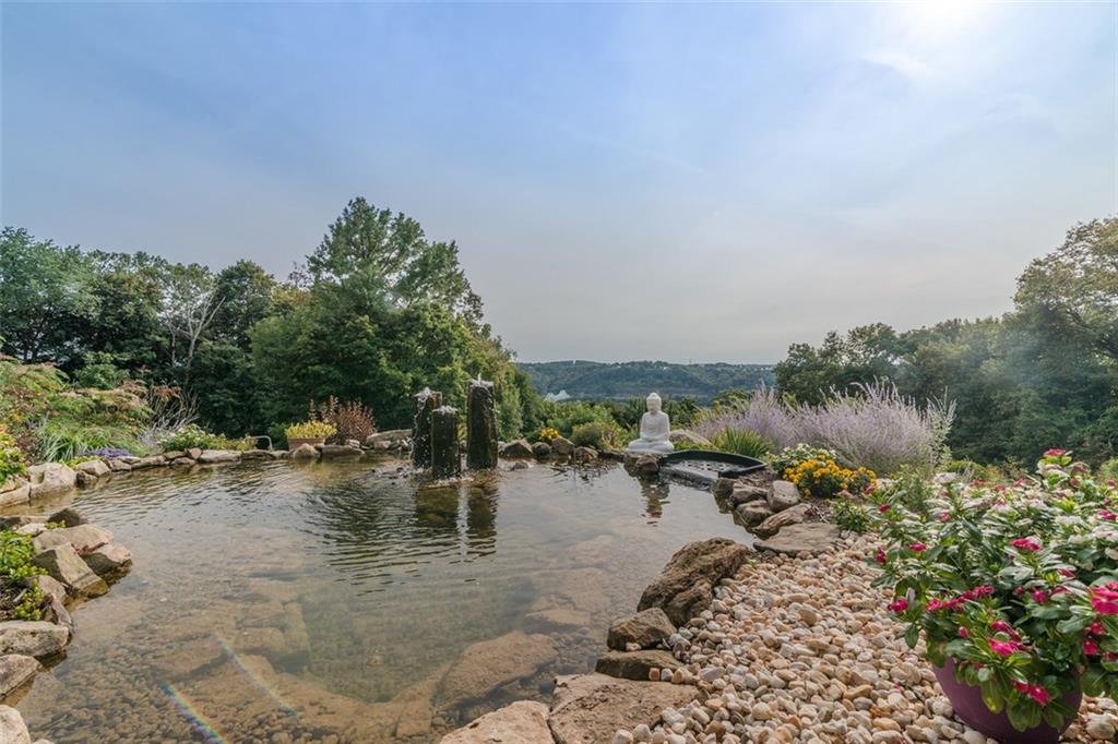 450 Backbone Road Sewickley, PA 15143 - Photo 2 of 24 The pond attracts occasional small wildlife, who stop by to cool off. The three standing water features allow a continual water flow, and the soft sound is so enjoyable.
