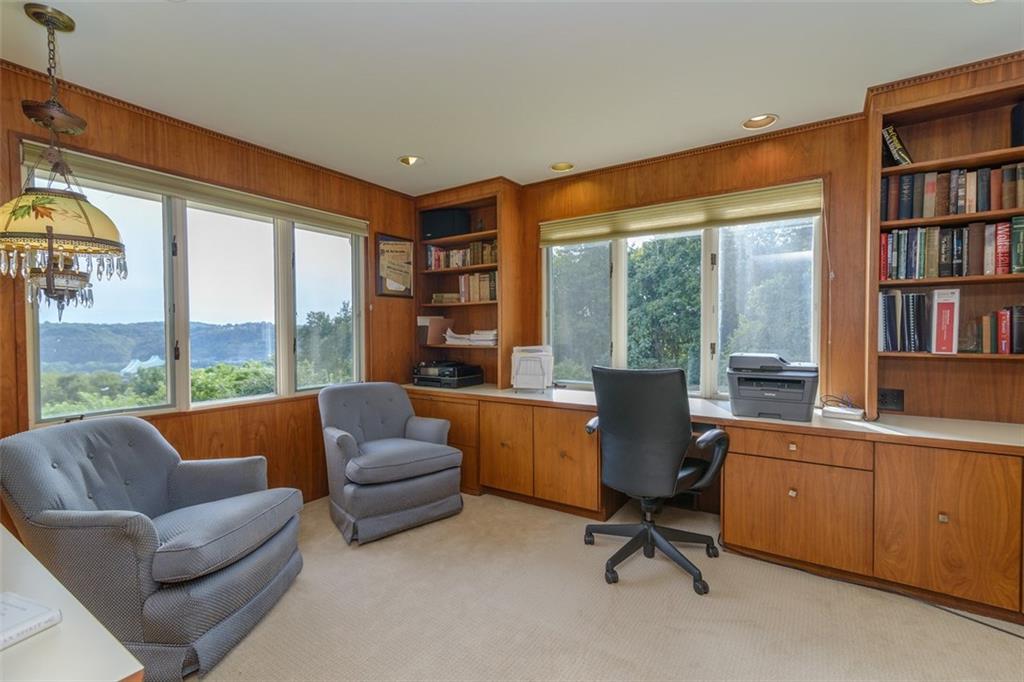 450 Backbone Road Sewickley, PA 15143 - Photo 11 of 24 The study/den is located in the right wing of the house, in a quiet space.
