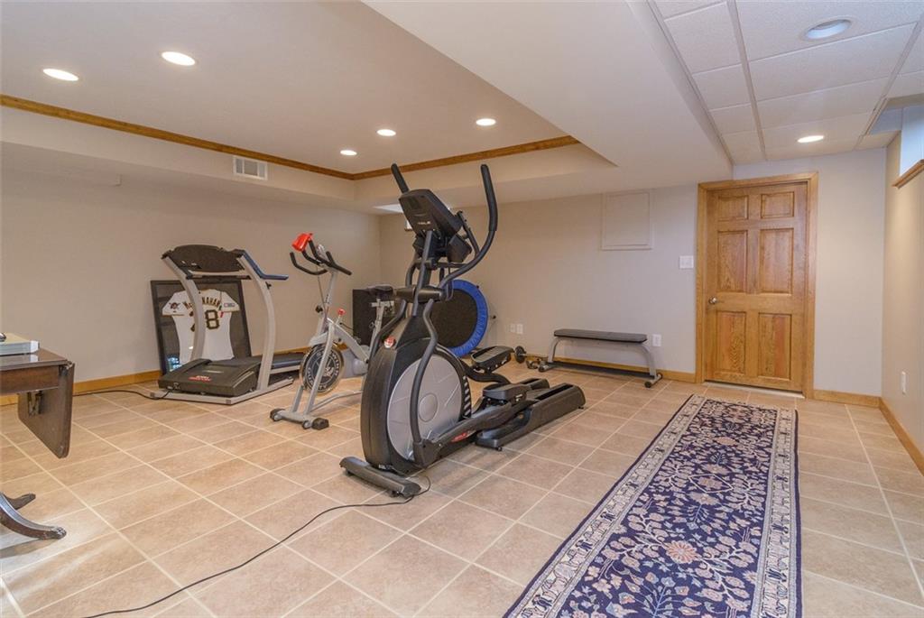 450 Backbone Road Sewickley, PA 15143 - Photo 17 of 24 The remodeled space is a perfect spot for a workout, with plenty of recessed lighting and lots of room.