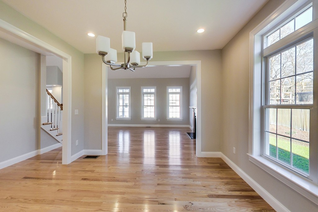 38 Cherry Street, Unit B Hudson, MA 01749 - Photo 12 of 38 a view of livingroom with hardwood floor and window