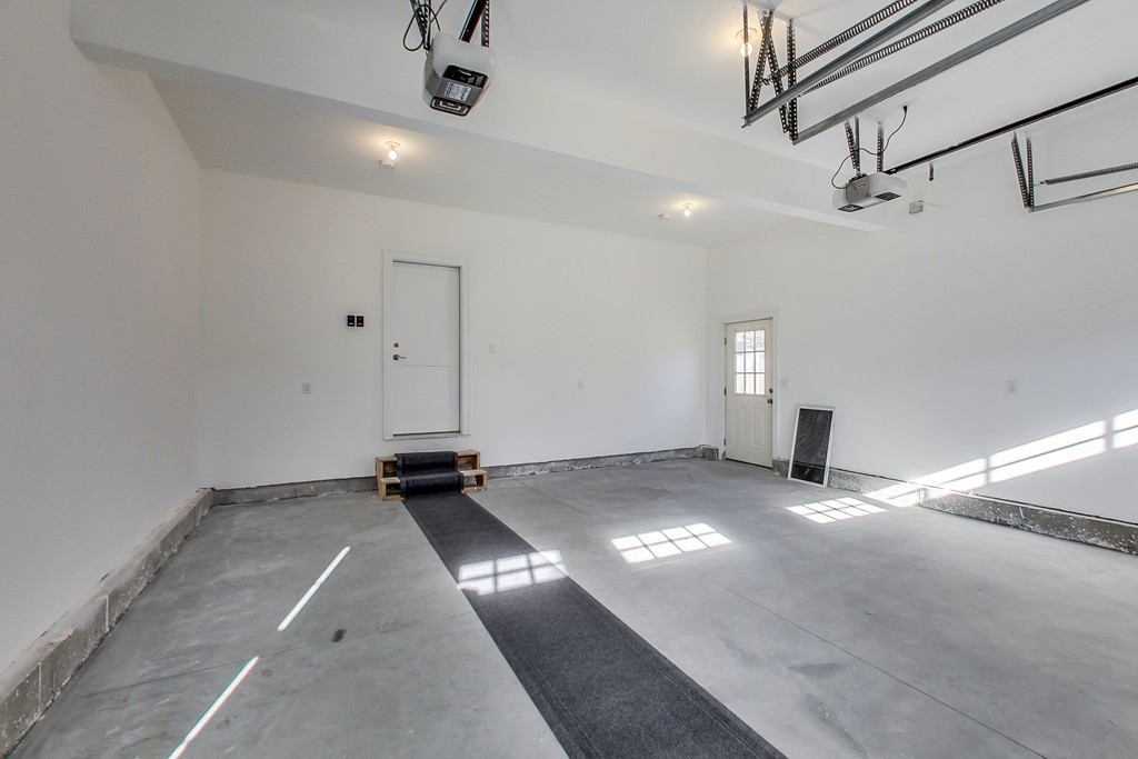 38 Cherry Street, Unit B Hudson, MA 01749 - Photo 30 of 38 a view of a room with gym equipment