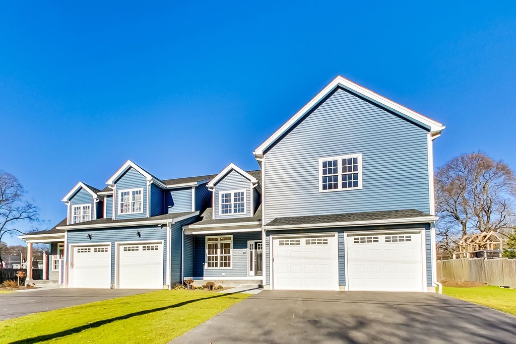 38 Cherry Street, Unit B Hudson, MA 01749 - Photo 3 of 38 a view of a house with a swimming pool