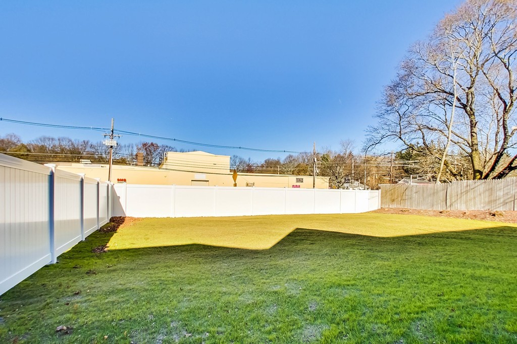 38 Cherry Street, Unit B Hudson, MA 01749 - Photo 34 of 38 a view of yard with swimming pool