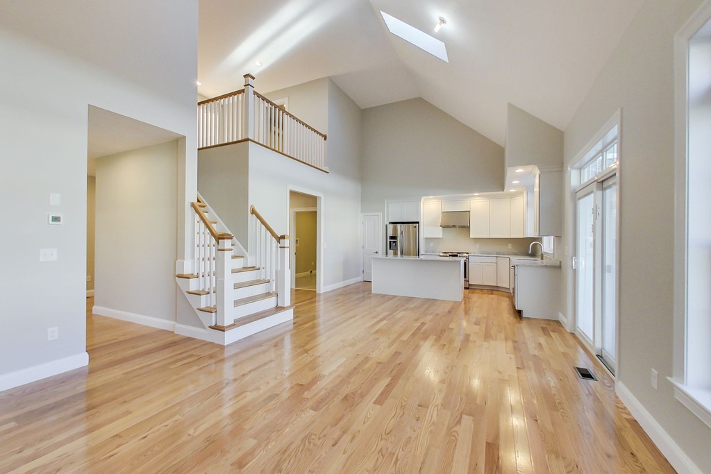 38 Cherry Street, Unit B Hudson, MA 01749 - Photo 4 of 38 a view of kitchen with wooden floor and electronic appliances