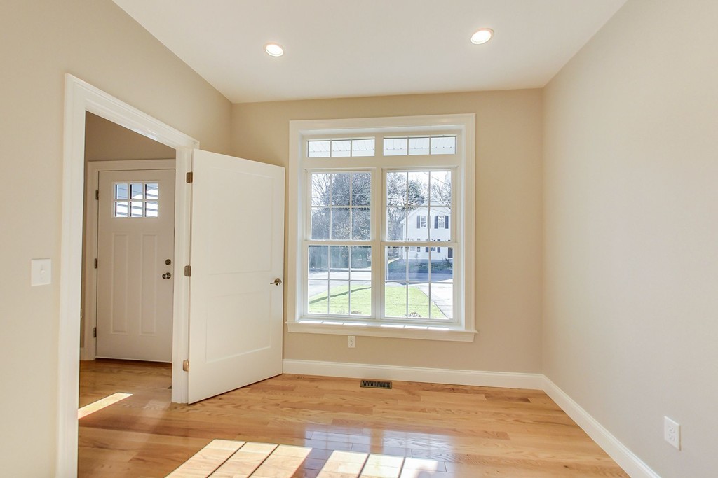 38 Cherry Street, Unit B Hudson, MA 01749 - Photo 5 of 38 a view of an empty room with a window