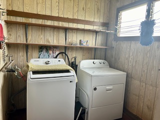 4670 Opu Road Kalaheo, HI 96741 - Photo 14 of 27 a utility room with dryer and washer