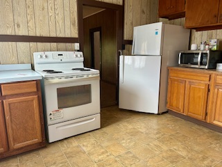 4670 Opu Road Kalaheo, HI 96741 - Photo 4 of 27 a utility room with dryer and washer