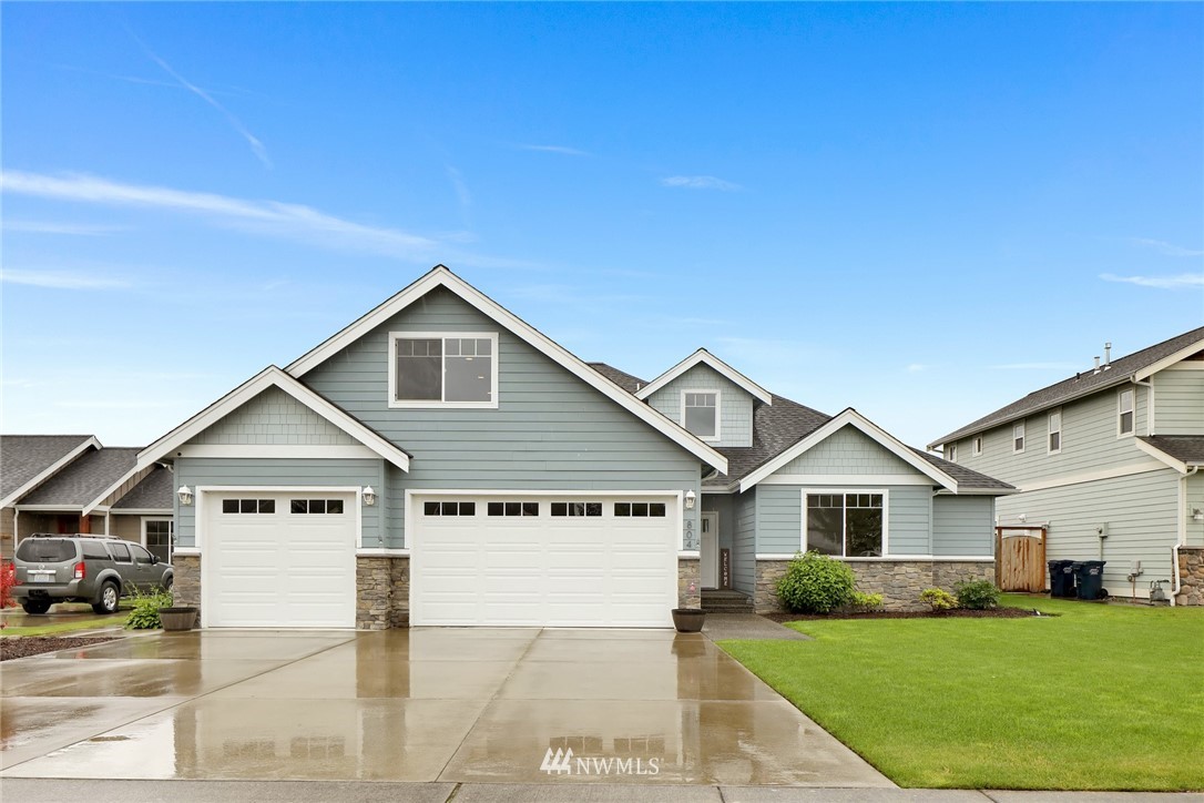 804 Red Maple Loop Everson, WA 98247 - Photo 1 of 40 a front view of a house with a yard