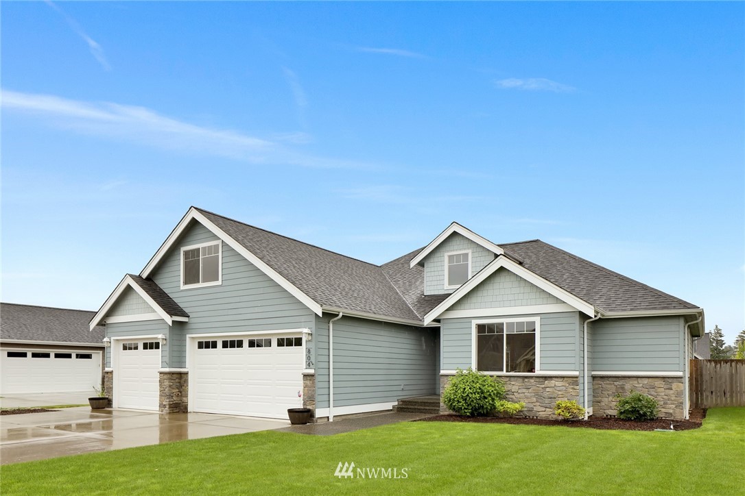 804 Red Maple Loop Everson, WA 98247 - Photo 2 of 40 a front view of a house with a yard